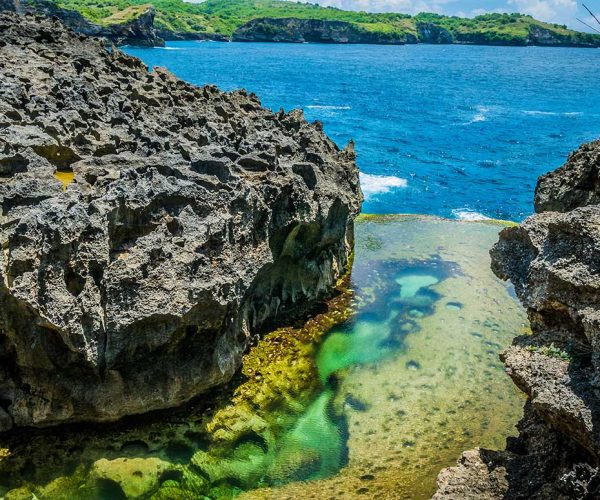 beautiful-cliff-formation-with-yellow-pool-bizarre-small.jpg